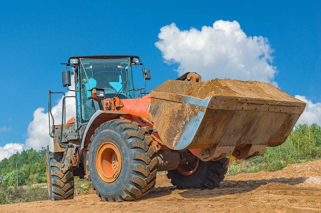 stock-photo-backhoe-loader-or-bulldozer-excavator